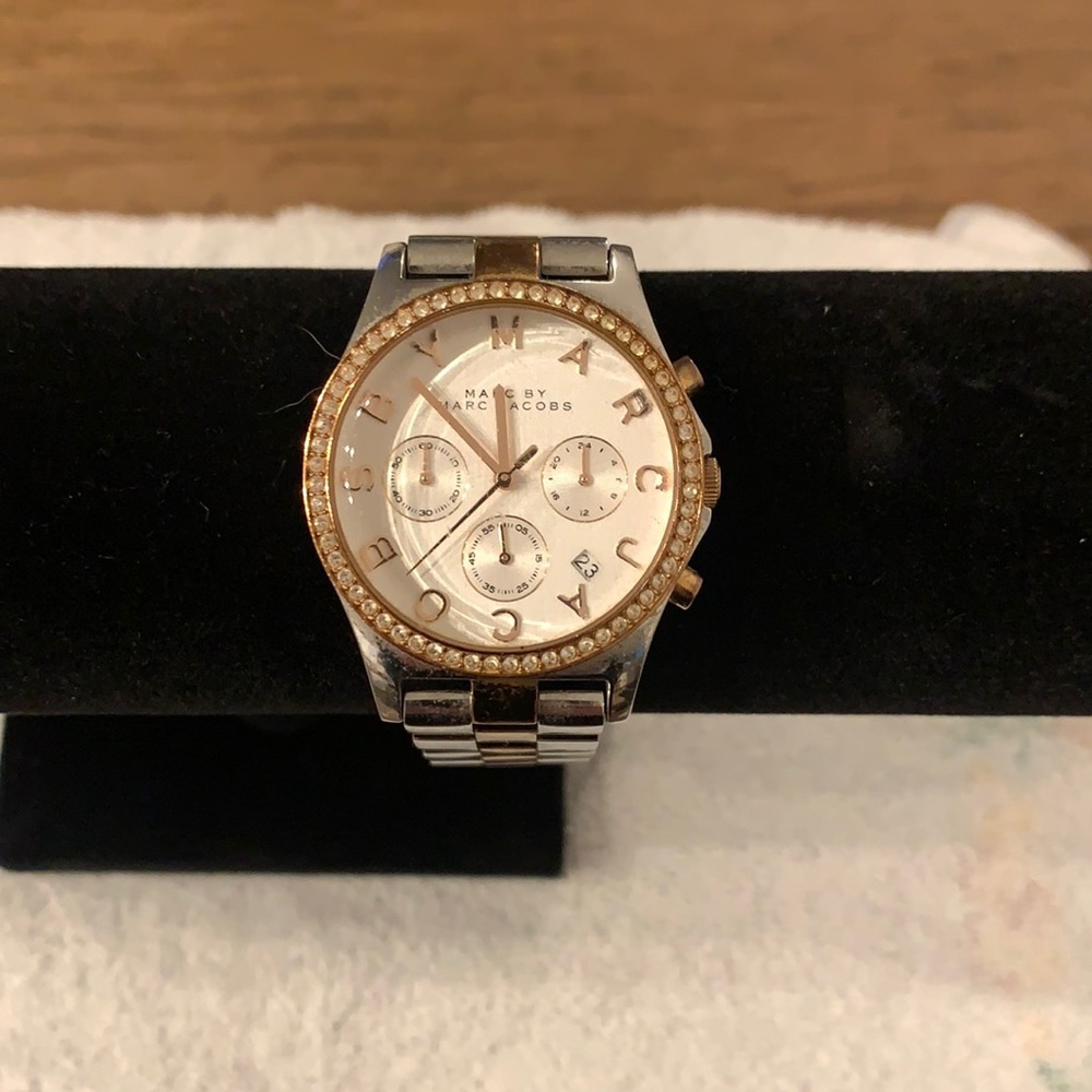 Woman’s stainless steel/ rose gold watch by Marc Jacob’s  size is 8 inches